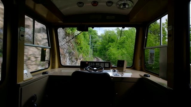 Empty cabin of a traveling train in the mountains of Switzerland