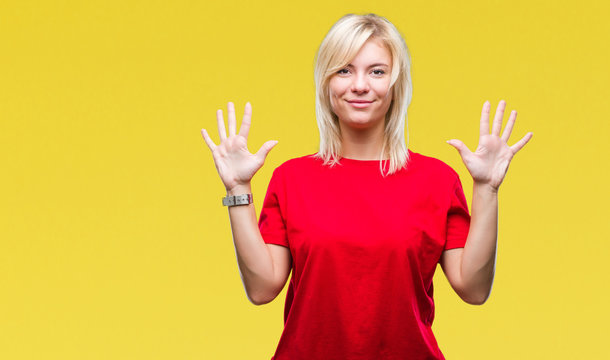 Young beautiful blonde woman wearing red t-shirt over isolated background showing and pointing up with fingers number ten while smiling confident and happy.