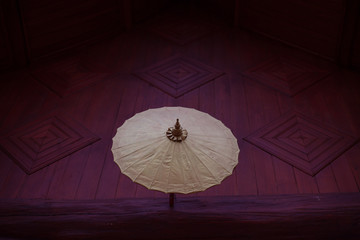 Ancient umbrella in the Thai temple