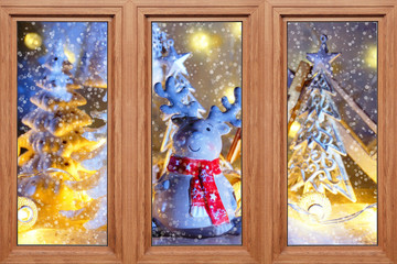 Holidays in winter scenery - view through the window - funny Christmas and seasonal scenes

