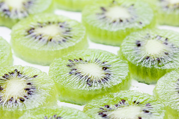 Kiwi fruit slices on white background