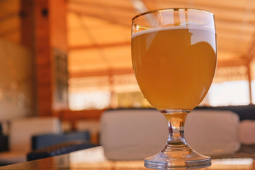 Beer glass on the bar counter.