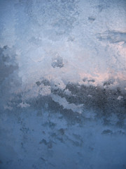 Fototapeta na wymiar Frosty pattern on winter window