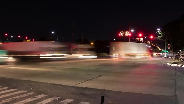 A Traffic time lapse shot at night in Manila, The Philippines. Shot by using an intervalometer and a long exposure time to get this beautiful motion blur  from the moving vehicles and their lights.