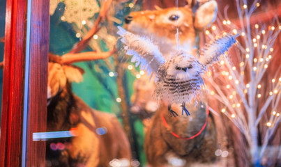 Stuffed Snowy Owl in a Christmas Display