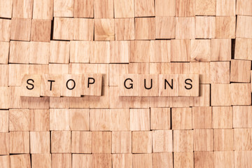 Stop Guns spelled out in wooden letters