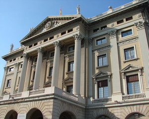 Panorama of unique buildings on the streets of the historical regions of the city against the background of the spring blue sky.
