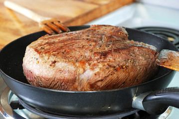 Browning Roast Beef in Skillet for Pot Roast Dinner