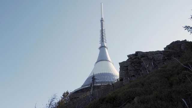 Pan shot of Jested, broadcasting tower ner Liberec, Czech Republic, famous monument.