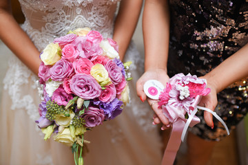 The bride with a bouquet. Comrade bride ready for hr best day. Beautiful wedding bouquet.