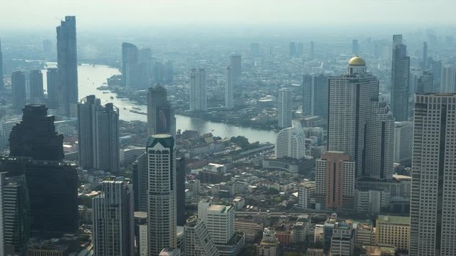 Time lapse - view on the Bangkok cityscape and Chao Phraya river