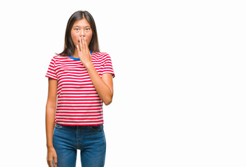 Obraz premium Young asian woman over isolated background shocked covering mouth with hands for mistake. Secret concept.