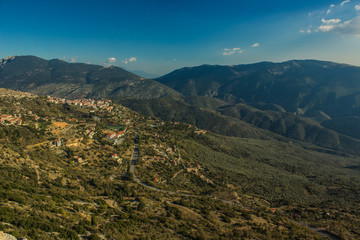 Naklejka premium highland south European village locality place aerial shot from above in mountain nature environment 