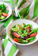 Fresh salad in bowls
