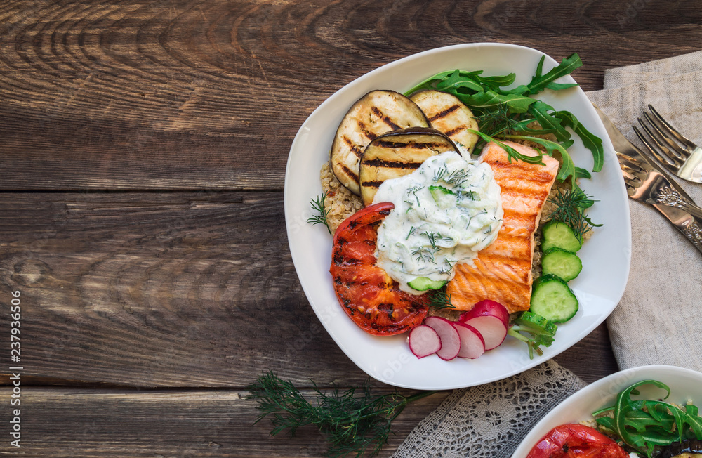 Sticker Grilled salmon, eggplants and tomatoes with quinoa and tzatziki sauce