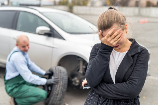 Angry Woman On Car Service With Broken Car