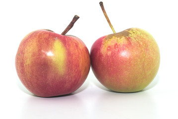 two red apple on a white background close-up