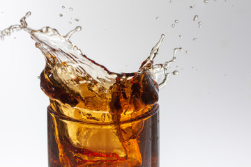cola splash, there is some movement in the splashes close up