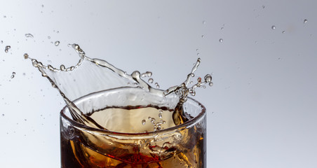 cola splash, there is some movement in the splashes close up