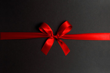 Shiny red satin ribbon bow