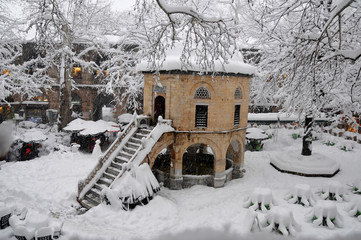 historic kozahan bazaar covered with snow © recepelal