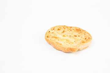 Friselle or Freselle, bread typical of the ancient tradition of southern Italy. The picture shows a slice on a white background without a central hole