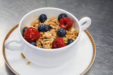 bowl of muesli with fresh berries