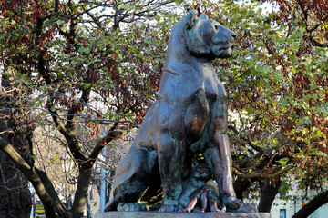 Sculpture of a lion in the city garden of Odessa.