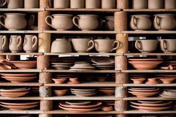 crafted pottery in portugal, still life of hand made pottery and ceramic bowls - 237945537