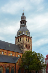 Fototapeta na wymiar Religious building. Riga Cathedral, Medieval Lutheran church with Romanesque, early Gothic and Baroque architectural features.