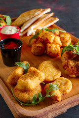 Wooden plate with snack for beer