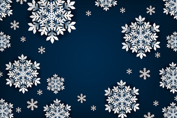 Christmas greeting card with paper snowflakes on blue background.