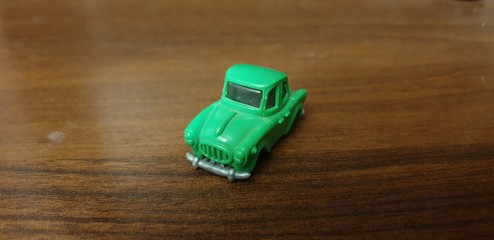 Green toy car close-up