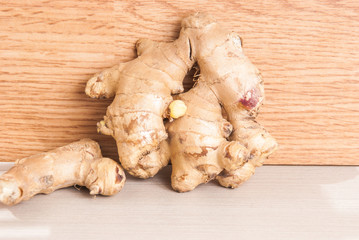 ginger root on the wooden background