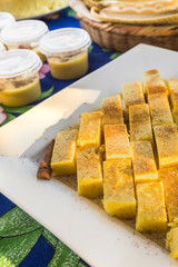 Slices of brazilian curau with cinnamon