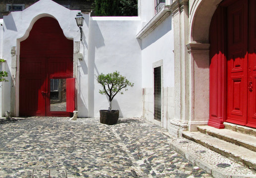 LIsboa. A White Court With Red Doors