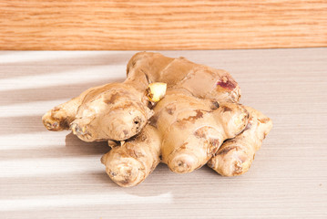ginger root on the wooden background