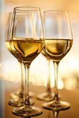 The glasses of white wine