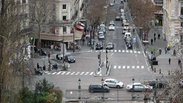 Cityscape of Paris: streets and crossroad with traffic