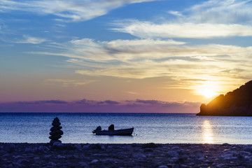 Sunrise or sunset over sea surface