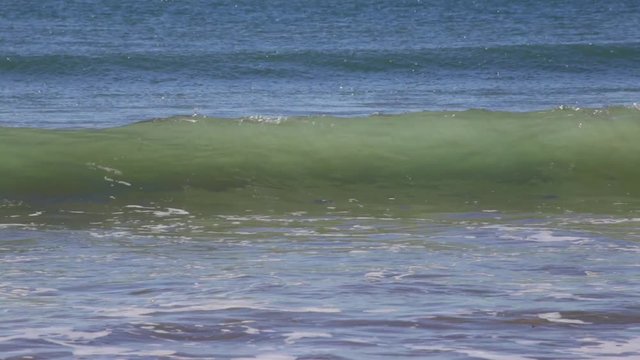 Light Breeze waves at sea Algave Portugal.