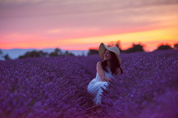 woman portrait in lavender flower fiel