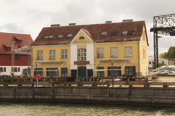 Old historical building near Dane river embankment in center of the Klaipeda (former german name of town is Memel).