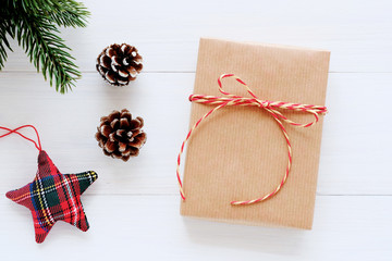 Brown vintage gift box and ornament on white wood background, Christmas, new year, valentine's day and anniversary greeting card