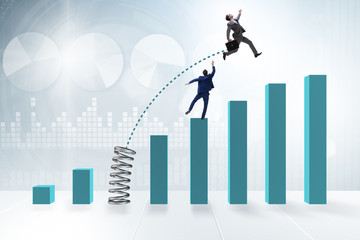 Businessman outperforming his competition jumping over