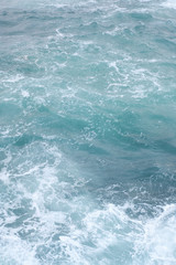 Fototapeta na wymiar raging ocean blue water