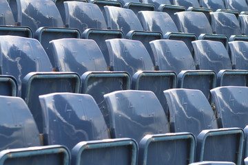 blue empty seats in stadium for watching sport or concert 