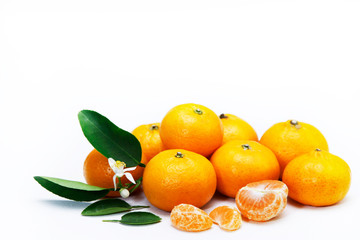 fresh oranges  with leaves on white isolated background