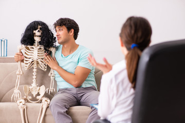 Young patient visiting psychologist for therapy