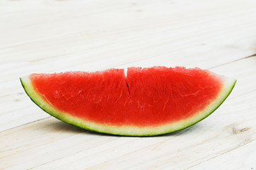 Sliced watermelon fruit on wooden table backgrounds